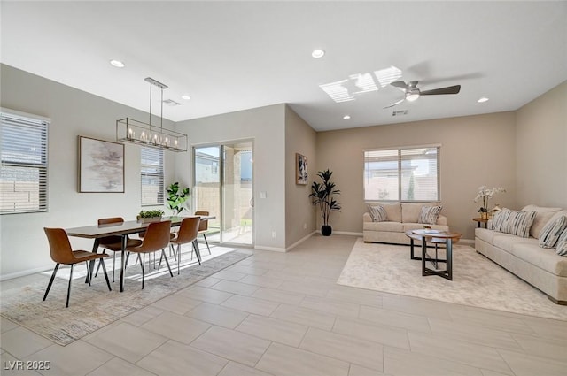 10251 Tiger Milkweed St, Las Vegas, NV 89141 - living room featuring ceiling fan, recessed lighting, and a chandelier
