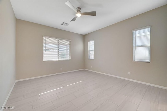 10251 Tiger Milkweed St, Las Vegas, NV 89141 - spare room with plenty of natural light and ceiling fan