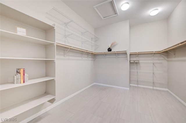 10251 Tiger Milkweed St, Las Vegas, NV 89141 - spacious closet featuring attic access