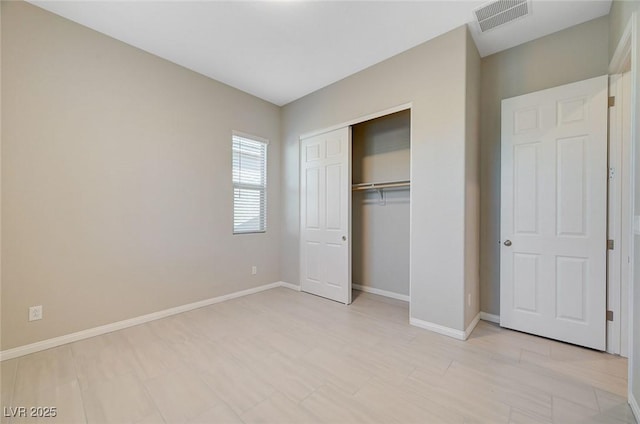 10251 Tiger Milkweed St, Las Vegas, NV 89141 - unfurnished bedroom featuring baseboards and a closet