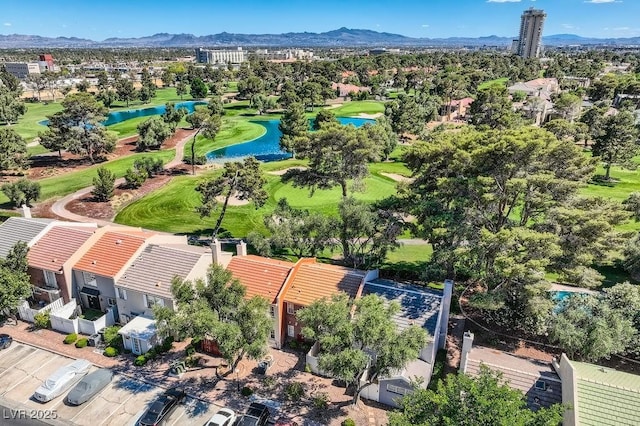 aerial view of residential area with a water and mountain view and a golf course