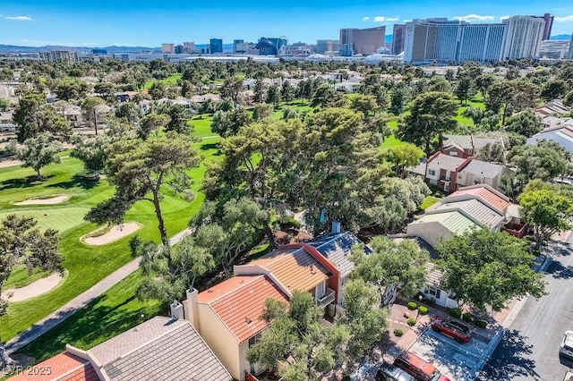 view of urban area with a golf club