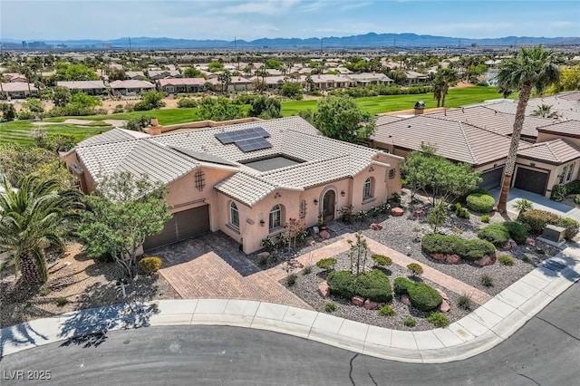 aerial view featuring a mountain view and a residential view