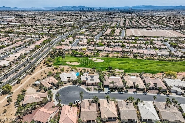 drone / aerial view featuring a mountain view and a residential view