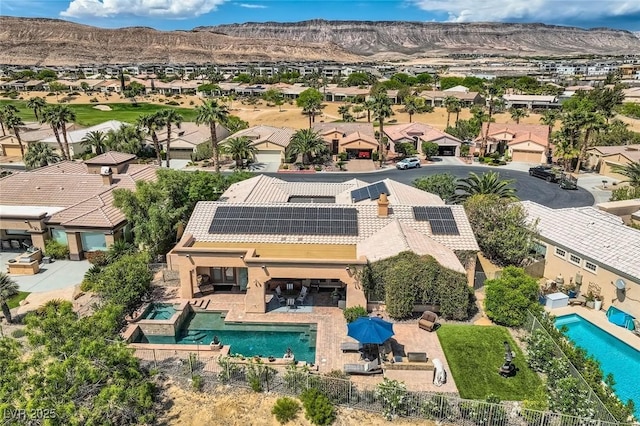 birds eye view of property featuring a residential view and a mountain view