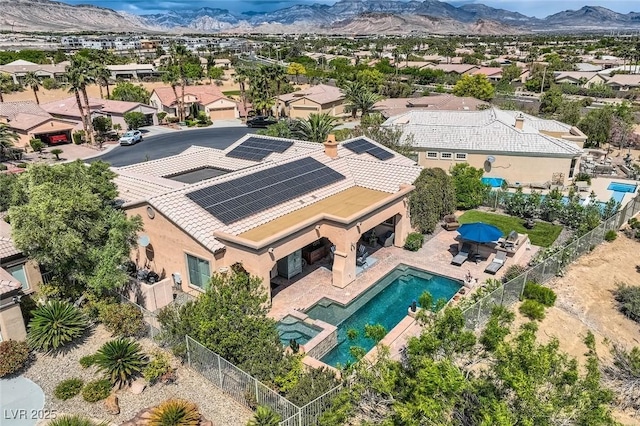 bird's eye view featuring a mountain view and a residential view