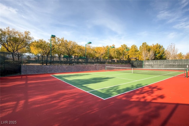 view of sport court with fence and community basketball court