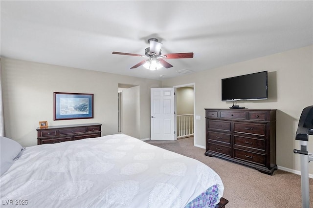 bedroom with baseboards, light carpet, and ceiling fan