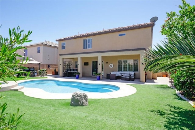back of property featuring an outdoor living space, a patio area, an outdoor pool, and stucco siding