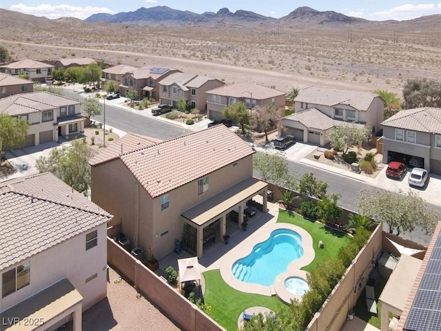 aerial view featuring a residential view and a mountain view