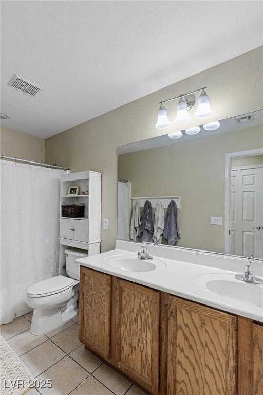 full bathroom featuring a sink, tile patterned flooring, and visible vents