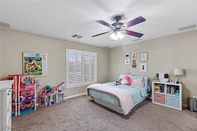 bedroom with carpet flooring, a ceiling fan, baseboards, and visible vents