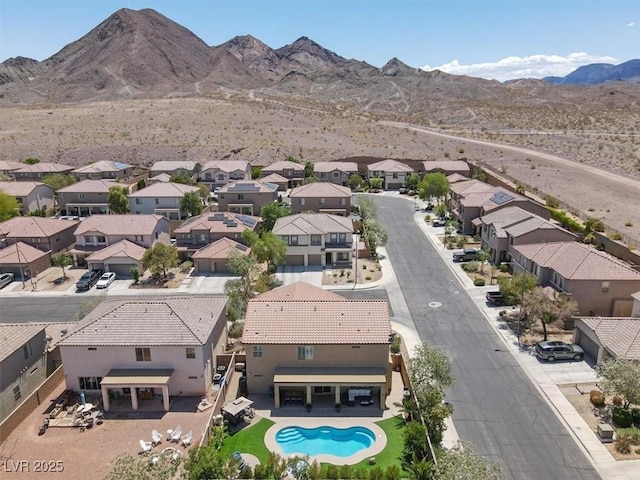 aerial view with a residential view and a mountain view