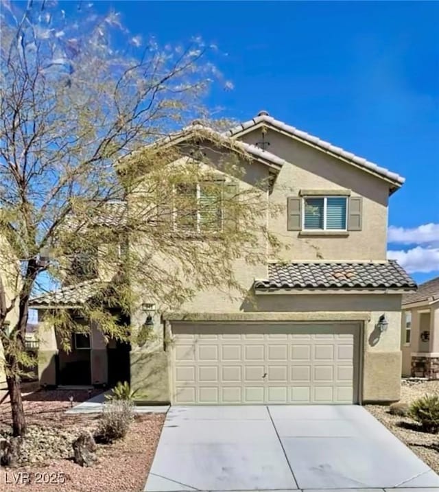 948 Crescent Falls St, Henderson, NV 89011 - traditional-style home with stucco siding, an attached garage, driveway, and a tiled roof