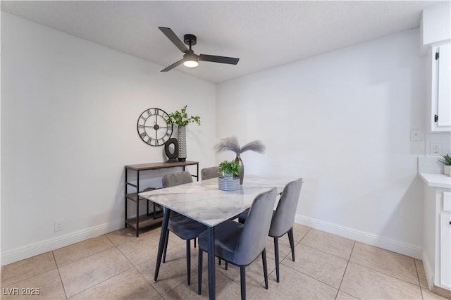 3151 Soaring Gulls Dr Unit 1168, Las Vegas, NV 89128 - dining area featuring a ceiling fan, baseboards, and light tile patterned flooring