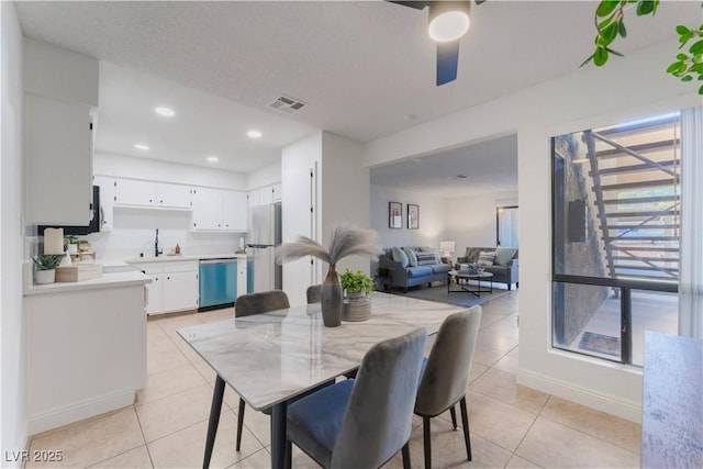 3151 Soaring Gulls Dr Unit 1168, Las Vegas, NV 89128 - dining area with visible vents, baseboards, recessed lighting, a ceiling fan, and light tile patterned floors