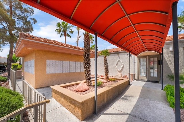 view of patio with mail area