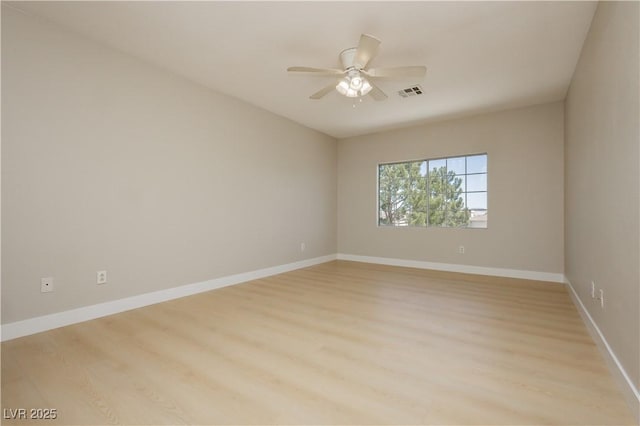1617 Cave Spring Dr, Henderson, NV 89014 - spare room featuring ceiling fan, visible vents, baseboards, and light wood-type flooring