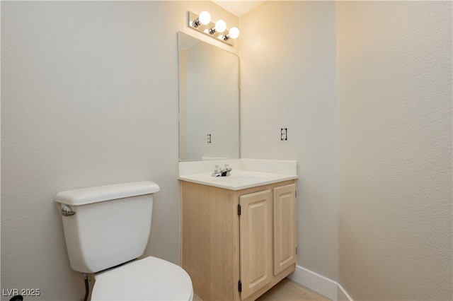 1617 Cave Spring Dr, Henderson, NV 89014 - bathroom with vanity, baseboards, and toilet
