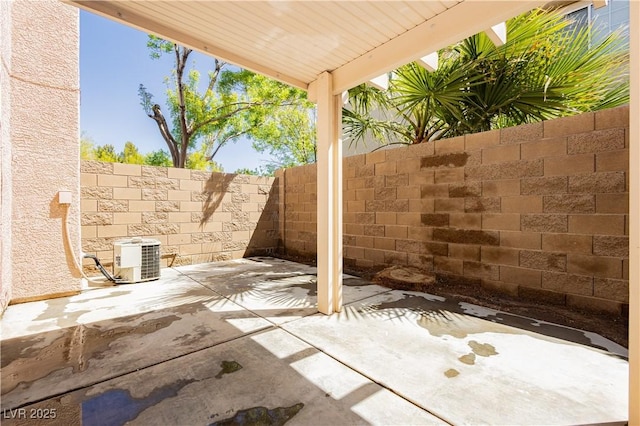 1617 Cave Spring Dr, Henderson, NV 89014 - view of patio with fence and cooling unit