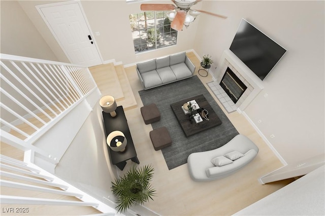 1617 Cave Spring Dr, Henderson, NV 89014 - living room featuring a ceiling fan and baseboards
