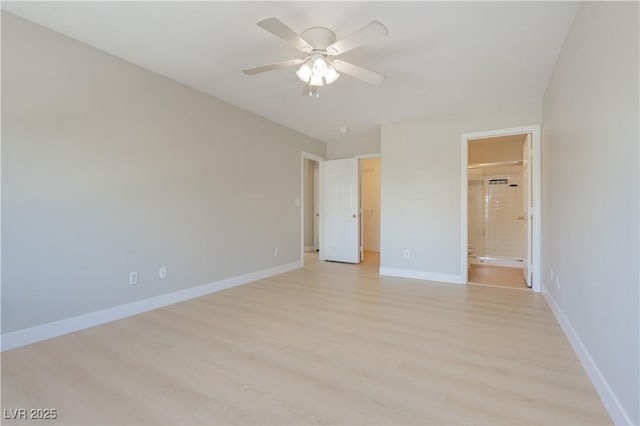1617 Cave Spring Dr, Henderson, NV 89014 - unfurnished bedroom featuring a ceiling fan, baseboards, light wood-style flooring, and ensuite bath