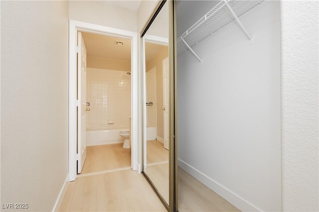1617 Cave Spring Dr, Henderson, NV 89014 - spacious closet featuring visible vents and light wood-type flooring