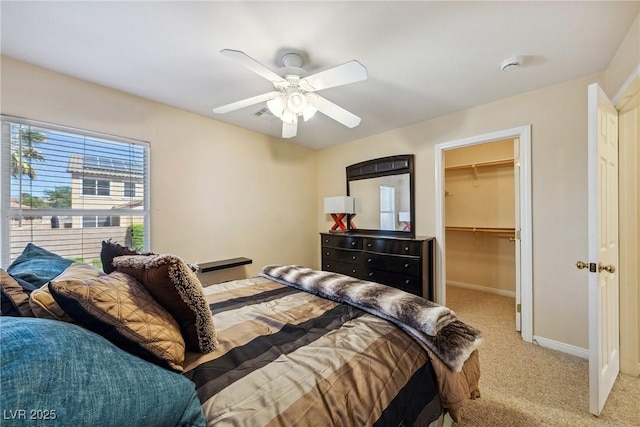 248 Hyssop Ct, Henderson, NV 89015 - bedroom featuring ceiling fan, baseboards, a closet, a spacious closet, and light carpet