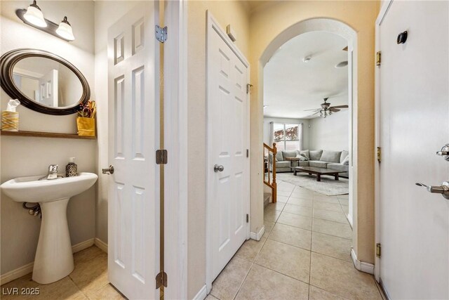 248 Hyssop Ct, Henderson, NV 89015 - bathroom with baseboards, ceiling fan, and tile patterned flooring