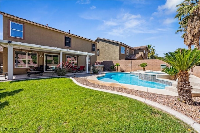 248 Hyssop Ct, Henderson, NV 89015 - view of pool with a lawn, a fenced backyard, a pool with connected hot tub, and a patio