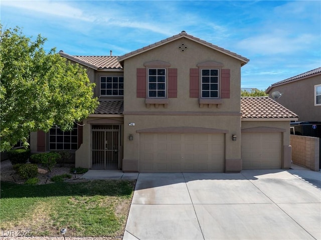 248 Hyssop Ct, Henderson, NV 89015 - view of front of home featuring a tiled roof, an attached garage, concrete driveway, and stucco siding