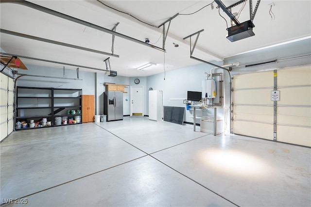 248 Hyssop Ct, Henderson, NV 89015 - garage featuring a garage door opener, water heater, and stainless steel fridge with ice dispenser