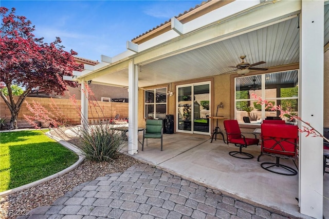 248 Hyssop Ct, Henderson, NV 89015 - view of patio / terrace featuring fence, a ceiling fan, and outdoor dining space