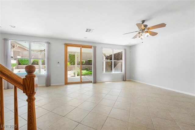 248 Hyssop Ct, Henderson, NV 89015 - unfurnished room with a ceiling fan, baseboards, visible vents, and light tile patterned floors