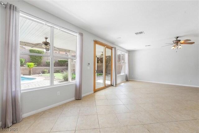 248 Hyssop Ct, Henderson, NV 89015 - empty room featuring light tile patterned floors, baseboards, ceiling fan, and visible vents