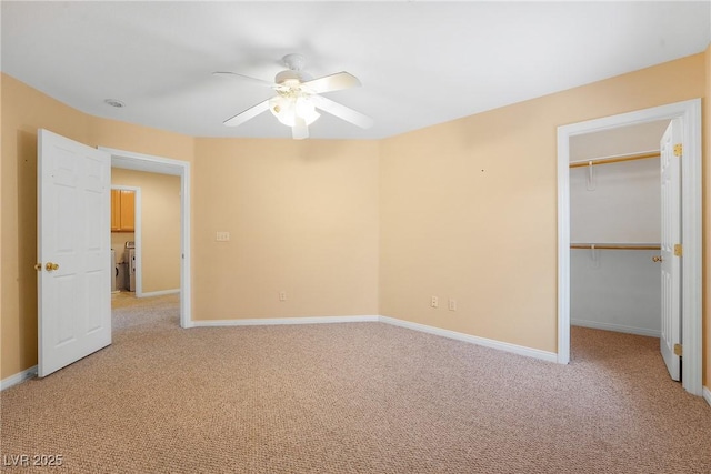 248 Hyssop Ct, Henderson, NV 89015 - unfurnished bedroom with a closet, light carpet, baseboards, ceiling fan, and a spacious closet