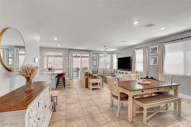 dining room with ceiling fan, recessed lighting, baseboards, light tile patterned floors, and visible vents
