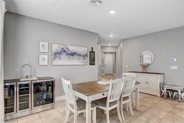 dining room with visible vents, recessed lighting, wine cooler, and light tile patterned floors