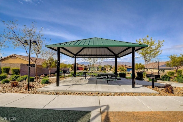 view of community with a patio and a gazebo