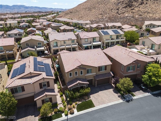 bird's eye view featuring a residential view and a mountain view
