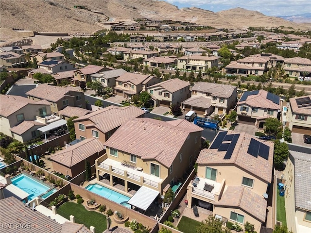 birds eye view of property featuring a residential view and a mountain view