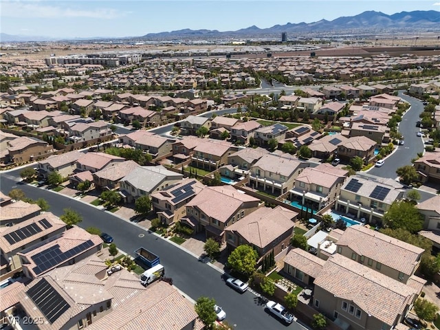 drone / aerial view featuring a mountain view and a residential view