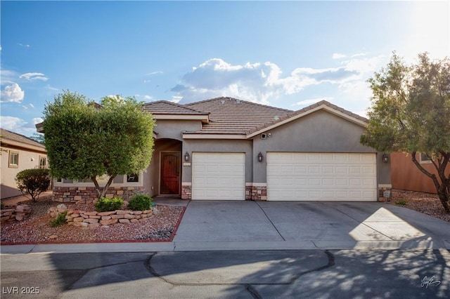 single story home featuring an attached garage, stone siding, stucco siding, concrete driveway, and a tiled roof