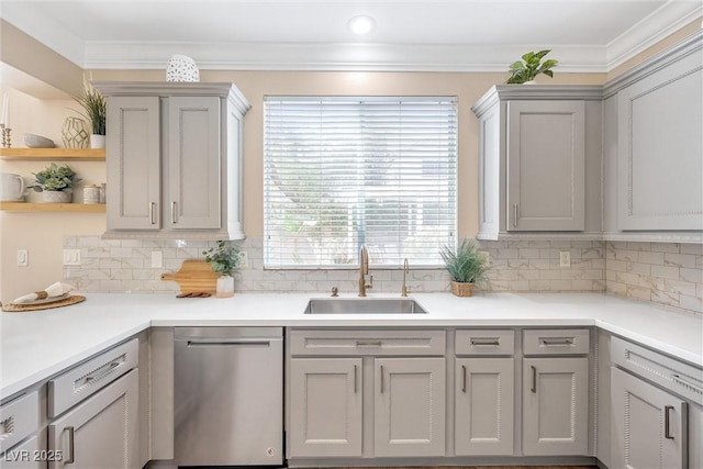 kitchen featuring open shelves, a sink, gray cabinets, backsplash, and stainless steel dishwasher