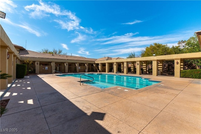 pool featuring a patio area
