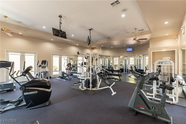 exercise room with ceiling fan, recessed lighting, and visible vents