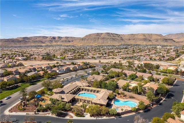 aerial view with a mountain view and a residential view