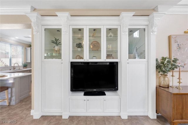 details with a sink and crown molding