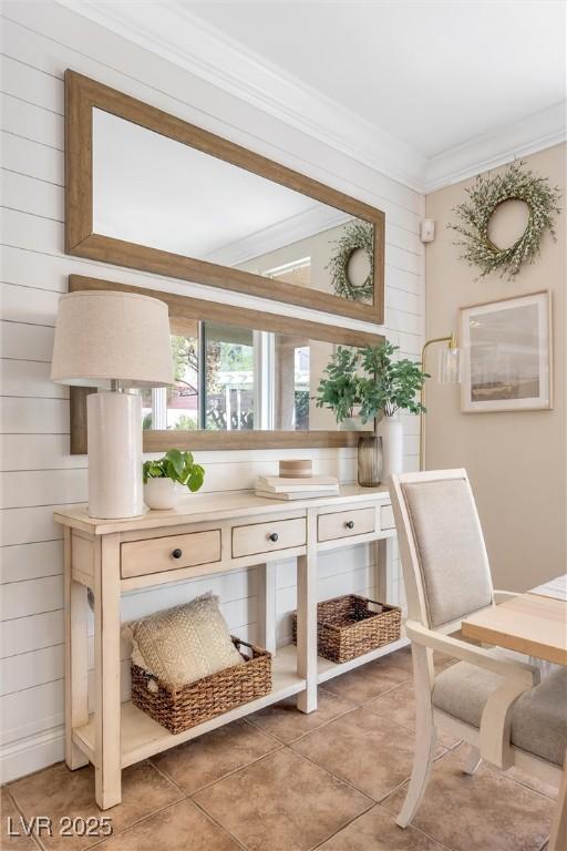 office space featuring ornamental molding and light tile patterned floors