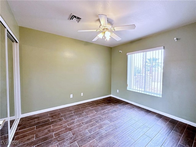 5704 Burdel St, Las Vegas, NV 89149 - unfurnished bedroom featuring ceiling fan, visible vents, wood finish floors, baseboards, and a closet